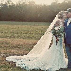 Size 4 wedding dress with custom straps and the veil I’m wearing here also